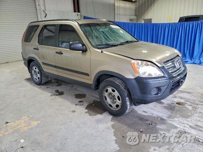 Czwarte zdjęcie samochodu z boku: 2006 HONDA CR-V LX VIN:JHLRD78526C039591 - miniatura
