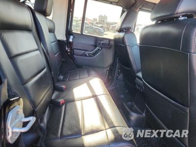 Zdjęcie 11 z 12 samochodu: 2012 JEEP WRANGLER UNLIMITED SAHARA VIN:1C4HJWEG3CL273073 - miniatura