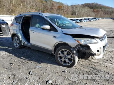 Czwarte zdjęcie samochodu z boku: 2014 FORD ESCAPE TITANIUM VIN:1FMCU0J95EUE23991 - miniatura