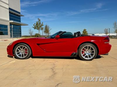 Zdjęcie 14 z 15 samochodu: 2004 DODGE VIPER SRT-10 VIN:1B3JZ65Z74V100319 - miniatura