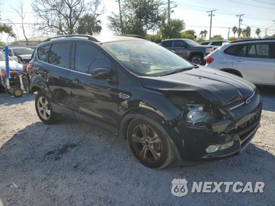 Czwarte zdjęcie samochodu z boku: 2014 FORD ESCAPE SE VIN:1FMCU0G99EUD50373 - miniatura