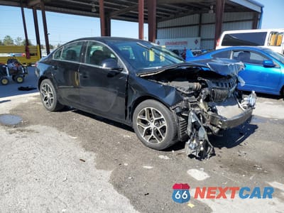 Czwarte zdjęcie samochodu z boku: 2017 BUICK REGAL SPORT TOURING VIN:2G4GL5EX1H9106057 - miniatura