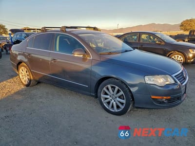 Czwarte zdjęcie samochodu z boku: 2010 VOLKSWAGEN PASSAT KOMFORT VIN:WVWJM7AN2AE102593 - miniatura