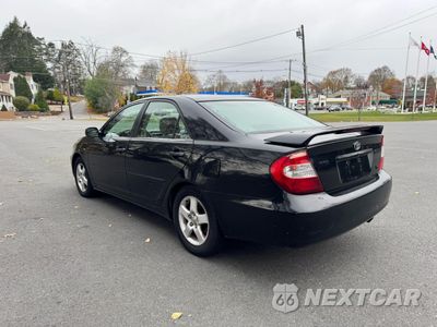 Trzecie zdjęcie samochodu z tyłu: 2002 TOYOTA CAMRY LE VIN:4T1BF30K42U013318 - miniatura