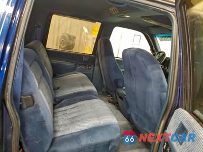 Zdjęcie 11 z 14 samochodu: 1993 CHEVROLET SUBURBAN K1500 VIN:1GNFK16K3PJ344968 - miniatura