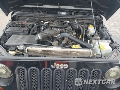 Zdjęcie 11 z 12 samochodu: 2011 JEEP WRANGLER SPORT VIN:1J4AA2D15BL631953 - miniatura
