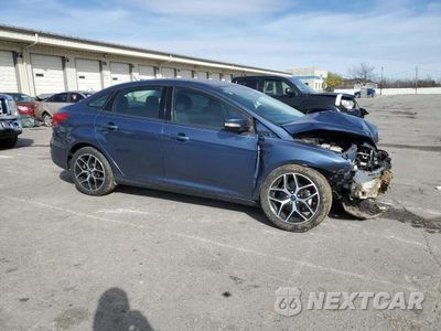 Czwarte zdjęcie samochodu z boku: 2018 FORD FOCUS SEL VIN:1FADP3H29JL276882 - miniatura