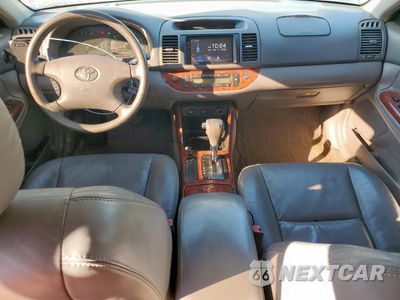 Zdjęcie 8 z 14 samochodu: 2003 TOYOTA CAMRY LE VIN:4T1BF30K43U059412 - miniatura
