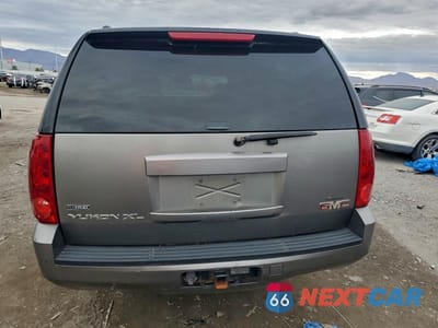 Zdjęcie 6 z 12 samochodu: 2007 GMC YUKON XL K1500 VIN:1GKFK16327J254409 - miniatura