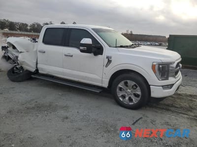 Czwarte zdjęcie samochodu z boku: 2022 FORD F150 SUPERCREW VIN:1FTEW1C80NFB63232 - miniatura