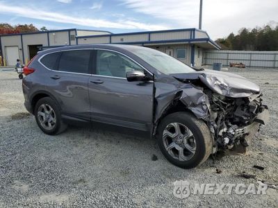 Czwarte zdjęcie samochodu z boku: 2018 HONDA CR-V EXL VIN:7FARW1H82JE010221 - miniatura