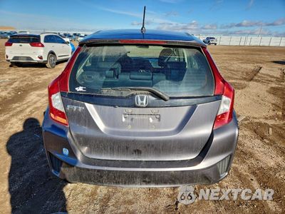 Zdjęcie 6 z 14 samochodu: 2015 HONDA FIT LX VIN:3HGGK5H54FM706837 - miniatura