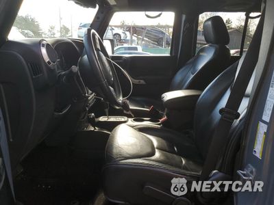 Zdjęcie 7 z 14 samochodu: 2014 JEEP WRANGLER UNLIMITED SAHARA VIN:1C4HJWEG5EL210785 - miniatura