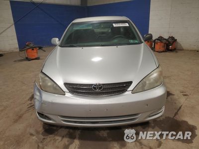 Piąte zdjęcie samochodu w środku: 2002 TOYOTA CAMRY LE VIN:4T1BE32K32U596822 - miniatura