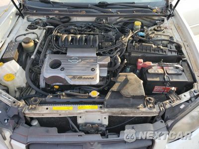 Zdjęcie 11 z 15 samochodu: 2001 NISSAN MAXIMA GXE VIN:JN1CA31D71T611868 - miniatura