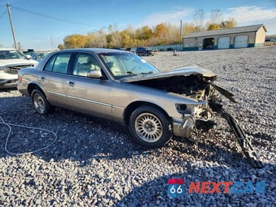 Czwarte zdjęcie samochodu z boku: 2001 MERCURY GRAND MARQUIS LS VIN:2MEFM75W31X643139 - miniatura