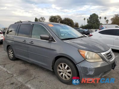 Czwarte zdjęcie samochodu z boku: 2010 HONDA ODYSSEY EXL VIN:5FNRL3H79AB094285 - miniatura