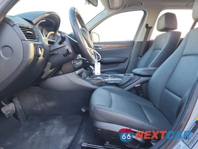 Zdjęcie 7 z 13 samochodu: 2014 BMW X1 SDRIVE28I VIN:WBAVM1C57EVW52208 - miniatura