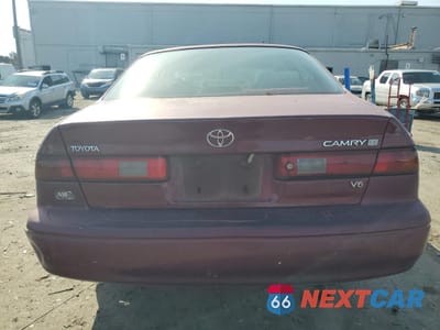 Zdjęcie 6 z 12 samochodu: 1997 TOYOTA CAMRY CE VIN:4T1BF22K5VU006390 - miniatura