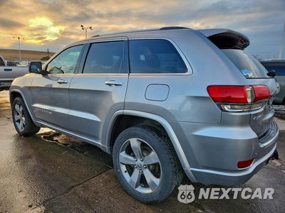 Drugie zdjęcie samochodu z przodu: 2014 JEEP GRAND CHEROKEE OVERLAND VIN:1C4RJFCG0EC386442 - miniatura