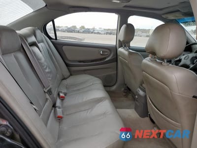 Zdjęcie 10 z 15 samochodu: 2000 NISSAN MAXIMA GLE VIN:JN1CA31A8YT211723 - miniatura