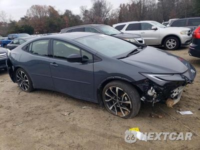 Czwarte zdjęcie samochodu z boku: 2024 TOYOTA PRIUS PRIME SE VIN:JTDACACU9R3026009 - miniatura