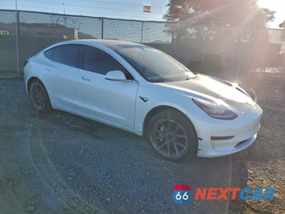 Czwarte zdjęcie samochodu z boku: 2020 TESLA MODEL 3 VIN:5YJ3E1EA5LF598405 - miniatura