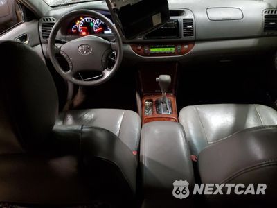Zdjęcie 8 z 14 samochodu: 2005 TOYOTA CAMRY LE VIN:4T1BF30K55U612023 - miniatura