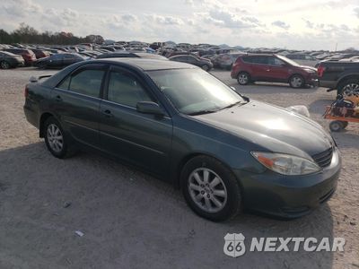 Czwarte zdjęcie samochodu z boku: 2002 TOYOTA CAMRY LE VIN:4T1BF32K52U506468 - miniatura