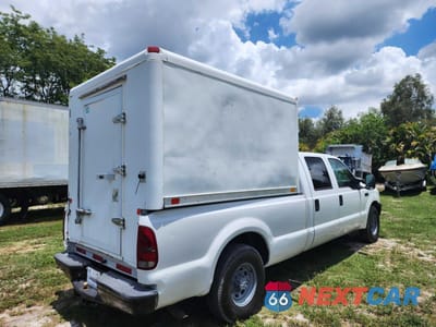 Czwarte zdjęcie samochodu z boku: 2004 FORD F250 SUPER - TRUCKS REFRIGERATED DELIVERY TRUCK VIN:1FTNW20L74EB55339 - miniatura
