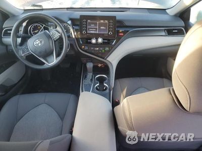 Zdjęcie 8 z 13 samochodu: 2022 TOYOTA CAMRY LE VIN:4T1C11AK8NU665336 - miniatura