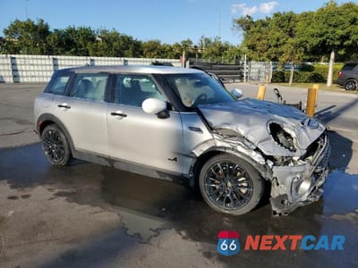 Czwarte zdjęcie samochodu z boku: 2023 MINI COOPER S CLUBMAN ALL4 VIN:WMWXJ1C04P2T84261 - miniatura