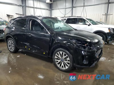 Czwarte zdjęcie samochodu z boku: 2020 FORD ESCAPE TITANIUM VIN:1FMCU9J98LUA56585 - miniatura