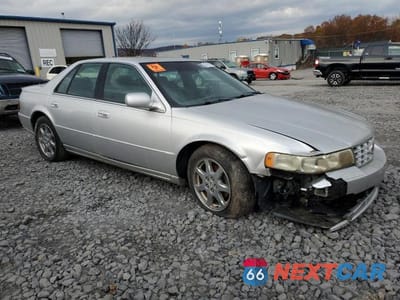 Czwarte zdjęcie samochodu z boku: 2003 CADILLAC SEVILLE STS VIN:1G6KY54953U126801 - miniatura