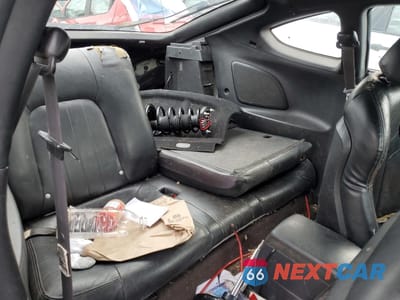 Zdjęcie 10 z 13 samochodu: 2003 HYUNDAI TIBURON VIN:KMHHN65F13U077098 - miniatura