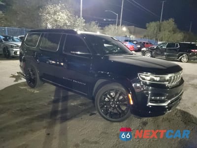 Czwarte zdjęcie samochodu z boku: 2022 JEEP GRAND WAGONEER SERIES III VIN:1C4SJVGJ2NS161141 - miniatura