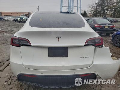 Zdjęcie 6 z 11 samochodu: 2022 TESLA MODEL Y VIN:7SAYGDEE9NF431216 - miniatura