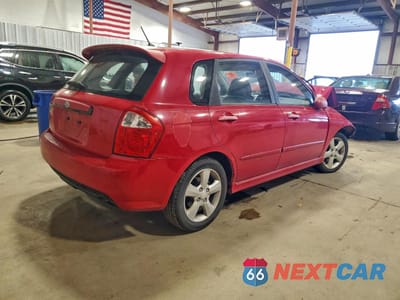 Trzecie zdjęcie samochodu z tyłu: 2009 KIA SPECTRA SX VIN:KNAFE242X95023558 - miniatura