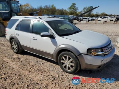 Czwarte zdjęcie samochodu z boku: 2008 FORD TAURUS X SEL VIN:1FMDK05W08GA32051 - miniatura