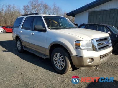 Czwarte zdjęcie samochodu z boku: 2014 FORD EXPEDITION XLT VIN:1FMJU1J54EEF26307 - miniatura