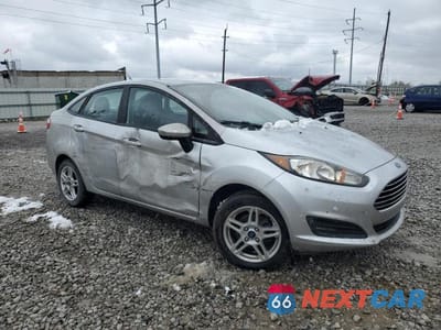Czwarte zdjęcie samochodu z boku: 2017 FORD FIESTA SE VIN:3FADP4BJ2HM128989 - miniatura