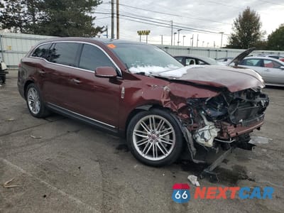 Czwarte zdjęcie samochodu z boku: 2015 LINCOLN MKT VIN:2LMHJ5AT4FBL01707 - miniatura
