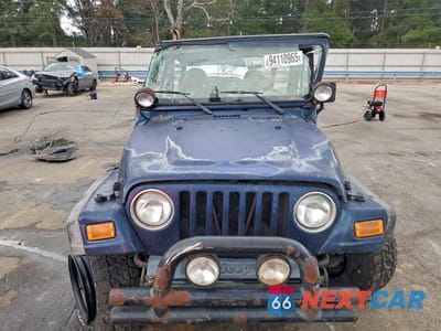 Piąte zdjęcie samochodu w środku: 2002 JEEP WRANGLER / TJ SPORT VIN:1J4FA49S72P713727 - miniatura