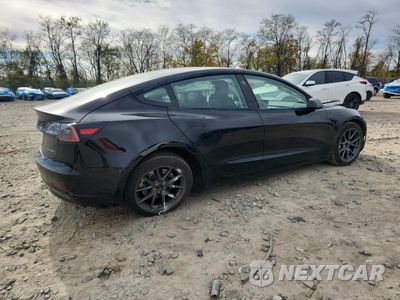 Trzecie zdjęcie samochodu z tyłu: 2023 TESLA MODEL 3 VIN:5YJ3E1EB6PF390922 - miniatura