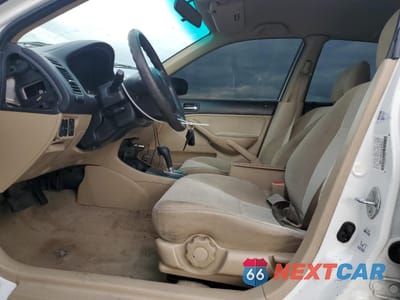 Zdjęcie 7 z 14 samochodu: 2004 HONDA CIVIC HYBRID VIN:JHMES96654S004411 - miniatura