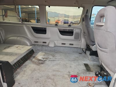 Zdjęcie 11 z 15 samochodu: 1999 FORD ECONOLINE E150 WAGON VIN:1FMRE11L9XHA28314 - miniatura