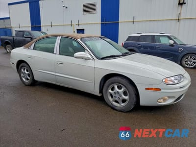 Czwarte zdjęcie samochodu z boku: 2001 OLDSMOBILE AURORA VIN:1G3GR64H714106415 - miniatura