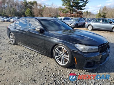 Czwarte zdjęcie samochodu z boku: 2017 BMW 740 I VIN:WBA7E2C51HG740336 - miniatura