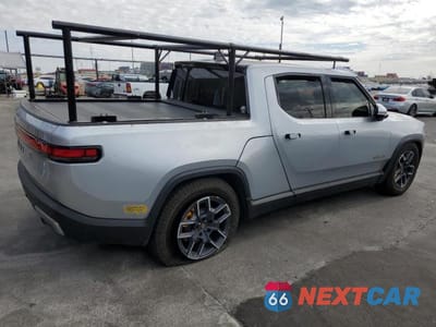 Trzecie zdjęcie samochodu z tyłu: 2022 RIVIAN R1T LAUNCH EDITION VIN:7FCTGAAL7NN001576 - miniatura