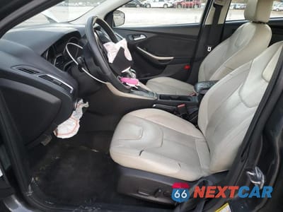 Zdjęcie 7 z 11 samochodu: 2018 FORD FOCUS TITANIUM VIN:1FADP3J24JL293941 - miniatura